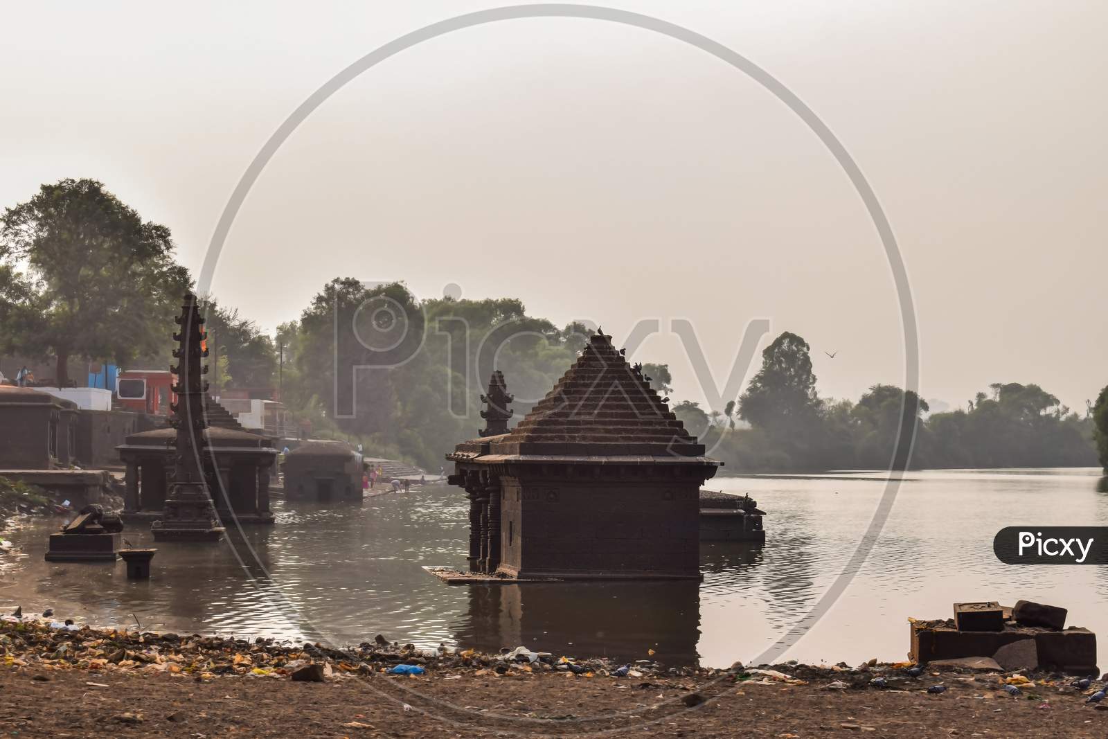 Ancient Ruined Hindu Temple Submerged In Panchganga River Kolhapur, Constructed From Black Stone.