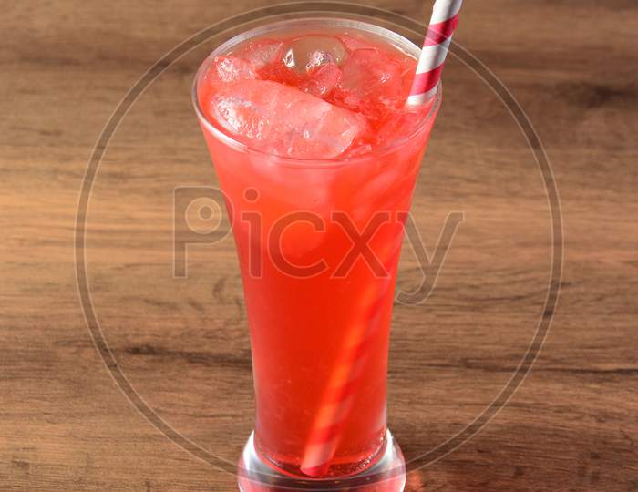 Strawberry Mocktail Served In A Glass Over A Rustic Wooden Background,A Refreshing Drink For Summer Days, Selective Focus On Top