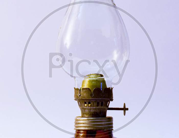 Vintage oil lamp on white background