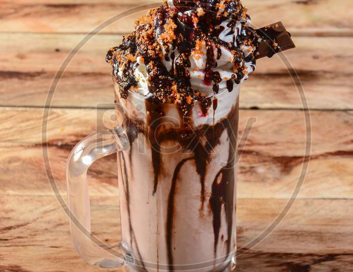 Glass Mason Jar With Ice Coffee On Wood Table Selective Focus On