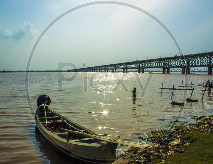 Lone Fishing Boat on Godavari River Bank in  Rajahmundry