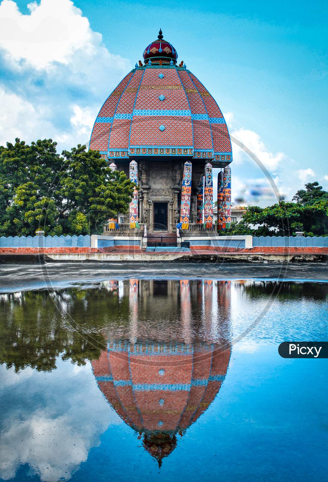 Reflection of an Temple Shrine In Water Surface