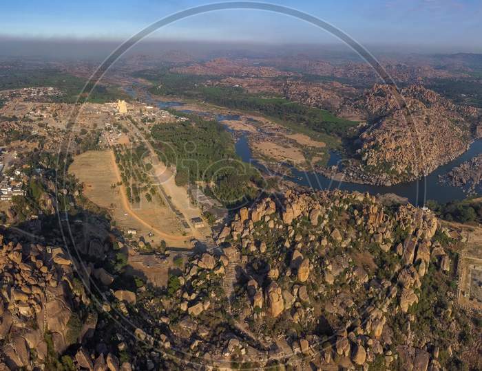 Aerial View Of Stone Hills and Tungabadra River Channel In Hampi
