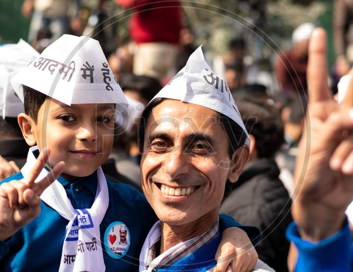Aam Aadmi Party AAP supporters celebrating victory in Delhi Assembly Election 2020