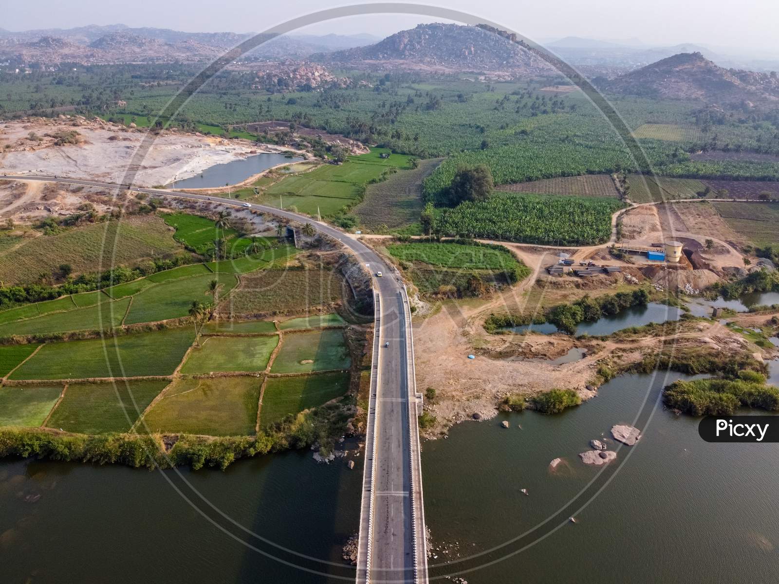 Aerial View Of Bridge Connecting North And South Hampi Over Tungabadra River