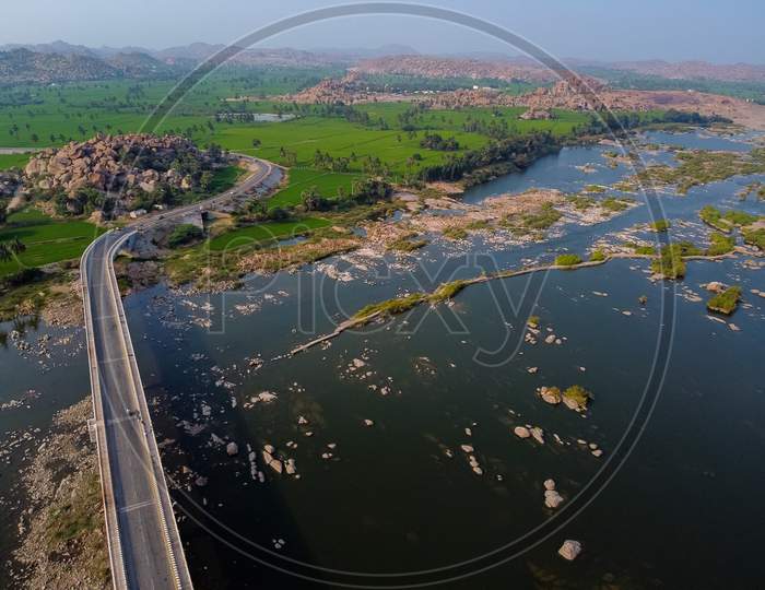 Aerial View Of Bridge Connecting North And South Hampi Over Tungabadra River