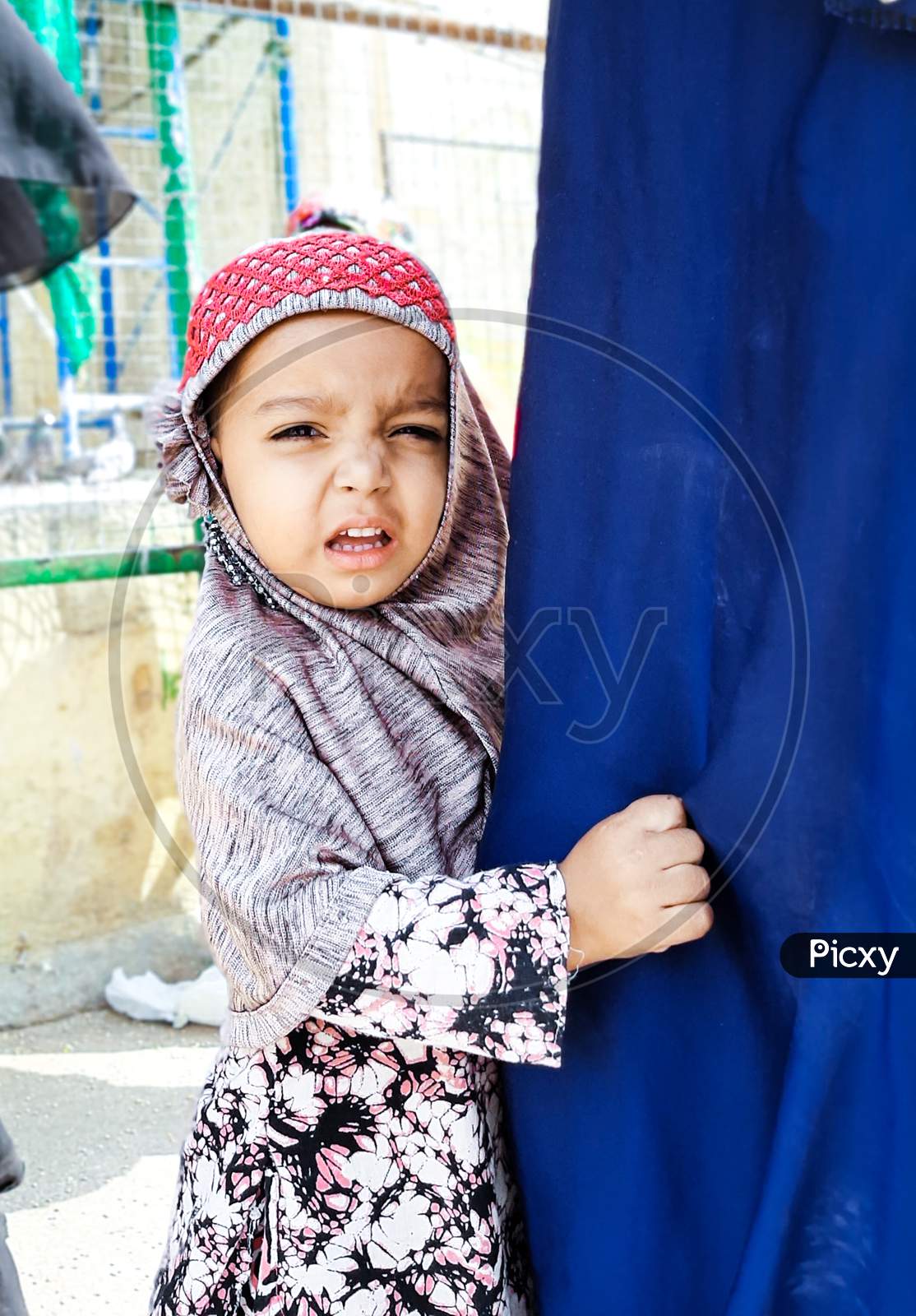 An Muslim Child Wearing Veil