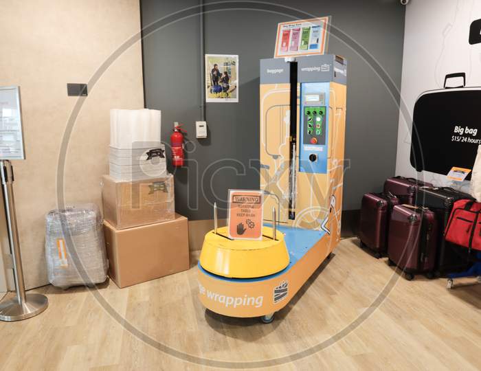 Baggage Wrapping Store At Changi Airport , Singapore