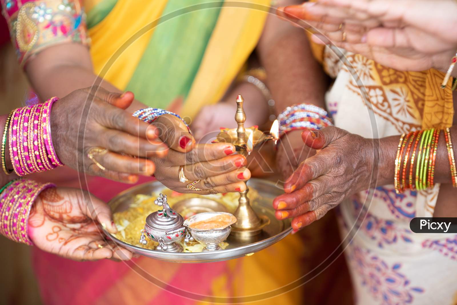 South Indian Wedding Rituals With Dias On Brass Plates  At Wedding Ceremony