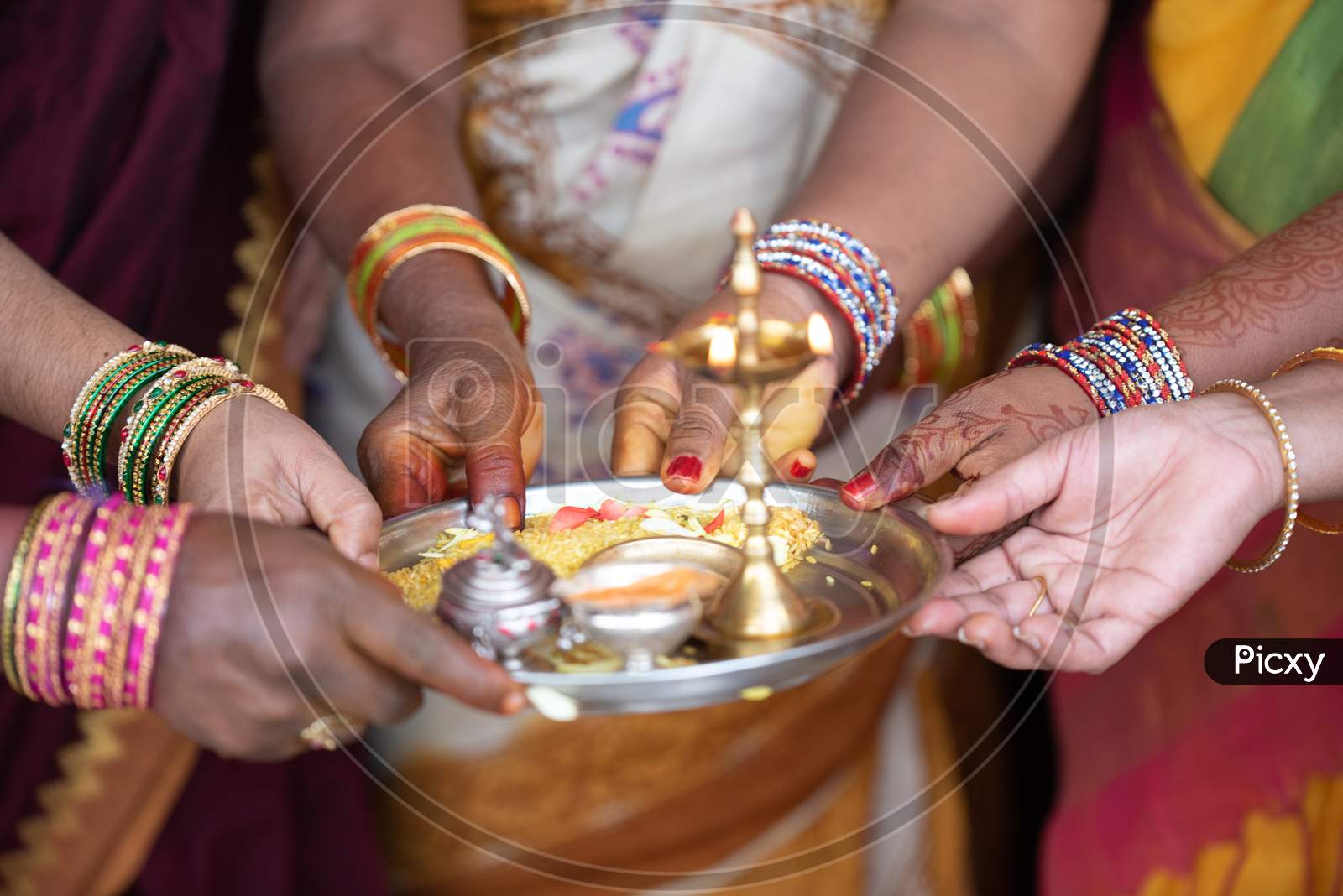 South Indian Wedding Rituals With Dias On Brass Plates  At Wedding Ceremony