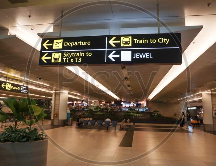 Direction Boards At Changi Airport Terminal , Singapore