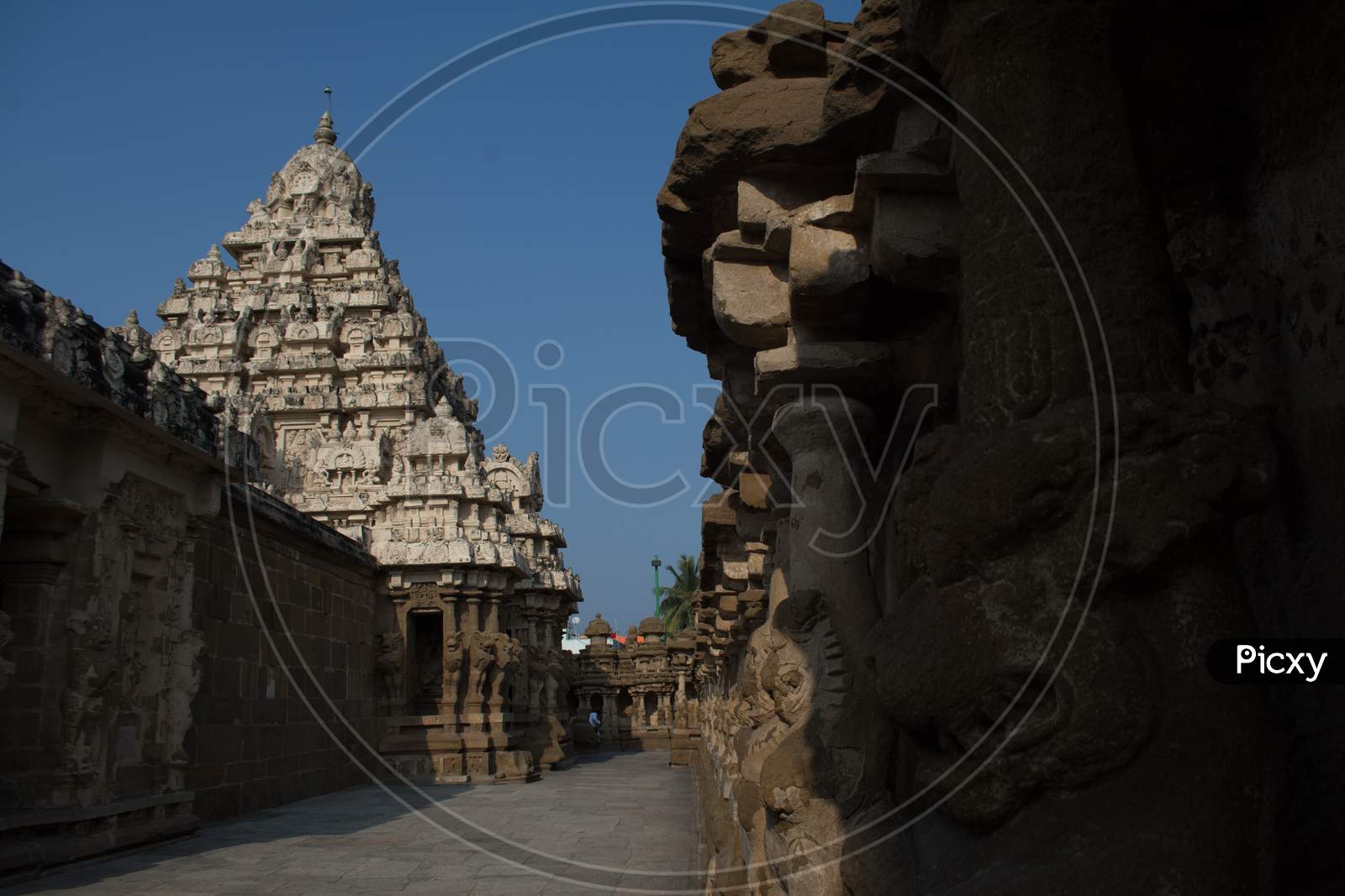 Architecture Of Ancient Hindu Temple With Stone Carved Temple Shrines