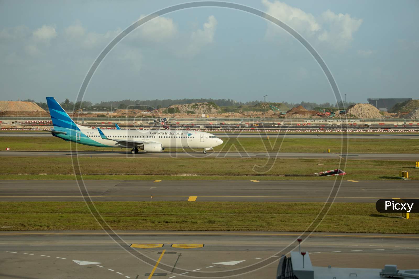 Garuda Indonesia  Flight In an Airport Terminal At  Chiang Airport Singapore