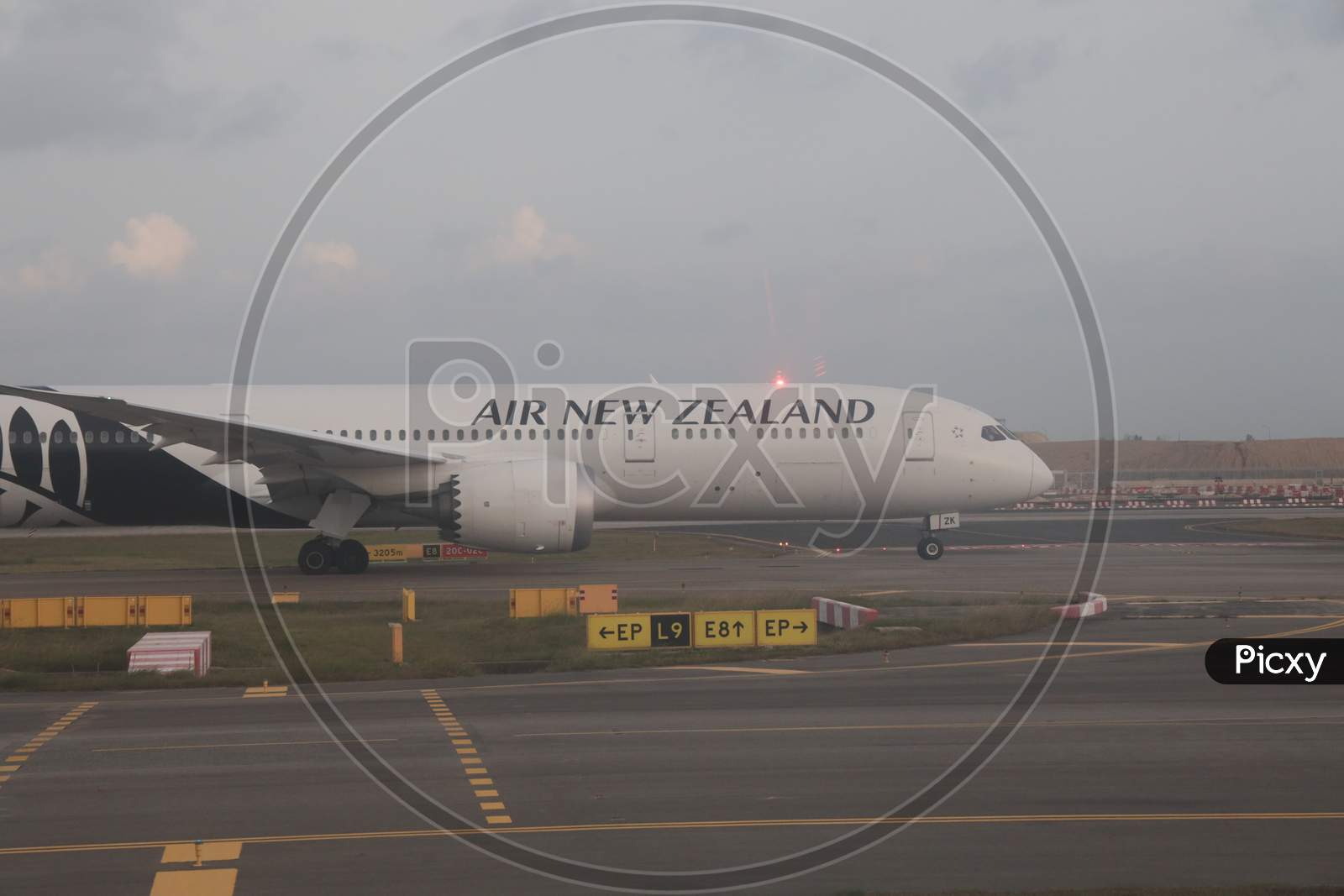 Air New Zealand Flights In an Airport Terminal At  Chiang Airport Singapore