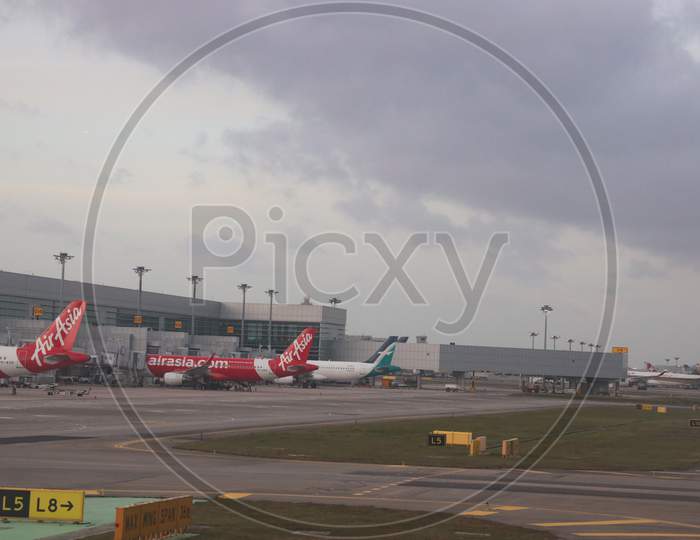 Air Asia Flights In an Airport Terminal At  Chiang Airport Singapore