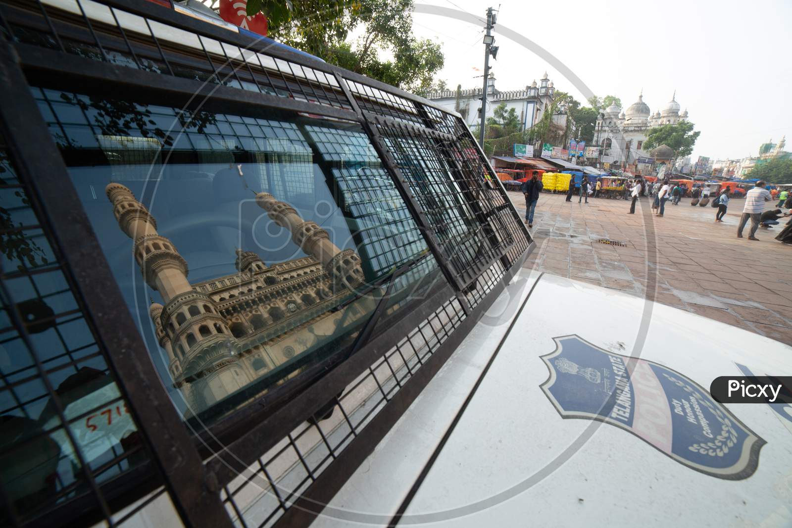 Reflection Of Charminar On Hyderabad Police Vehicle Glass