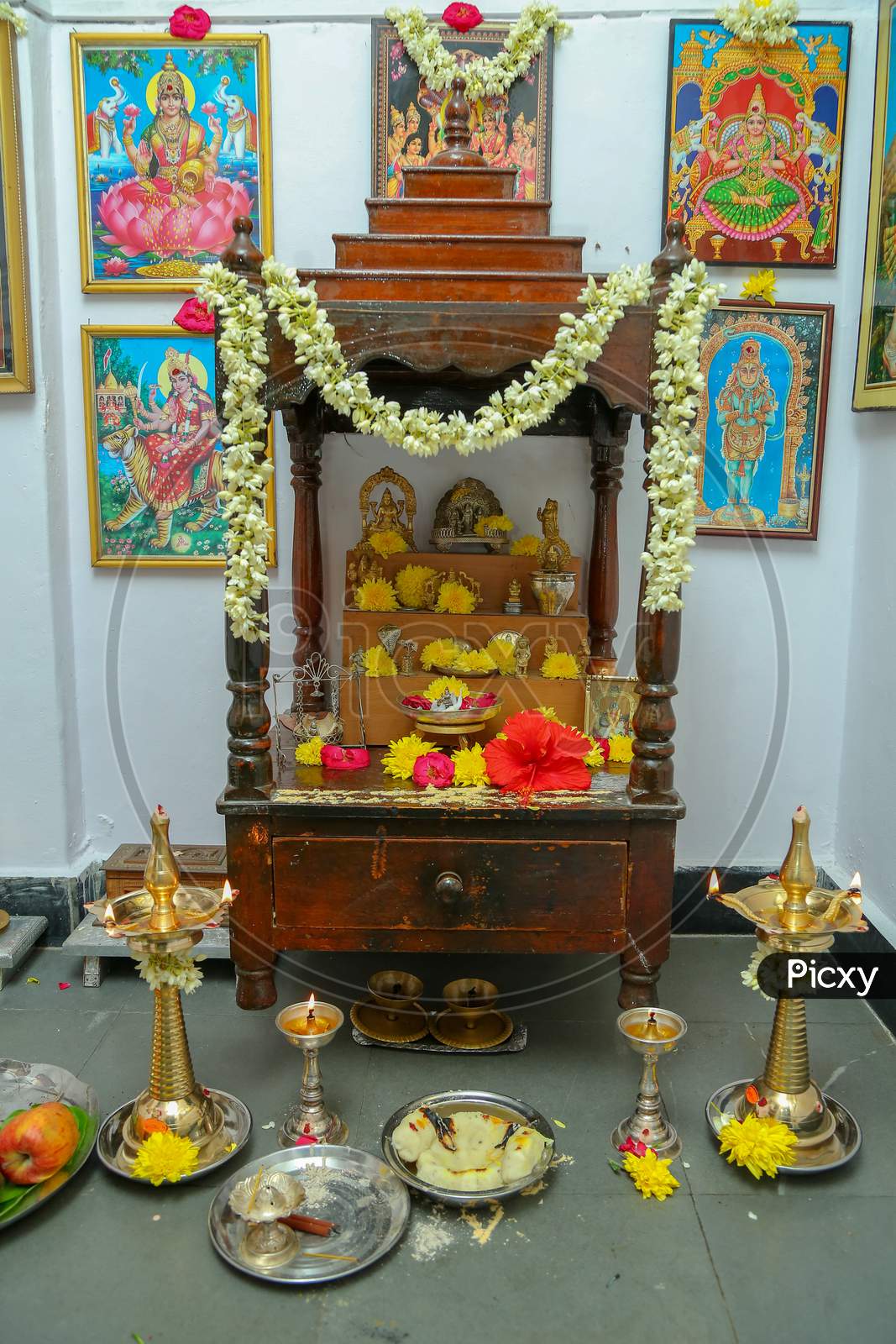 Hindu God Idols  And Photo frames  At  Pooja Rooms