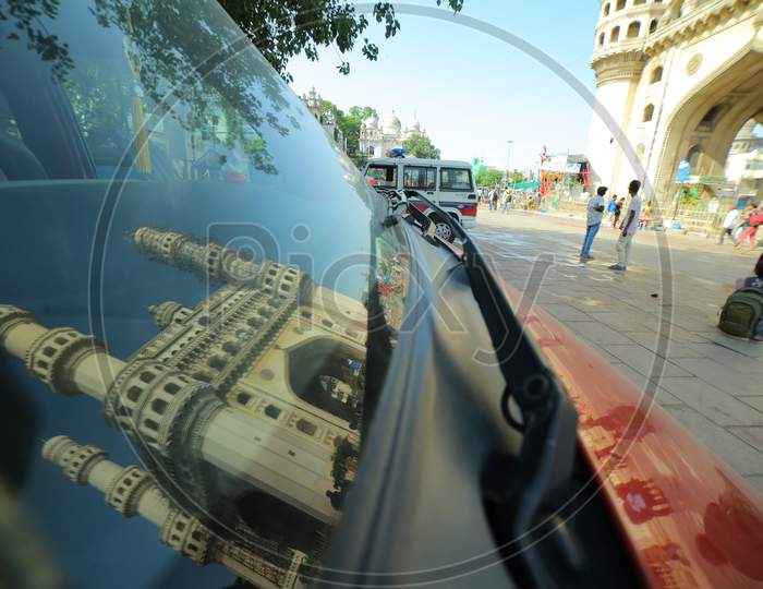 Reflection Of Charminar on Car Rare Glass Mirror