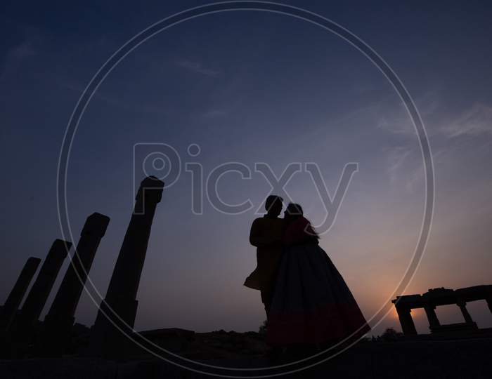 Silhouette of Couple At Hampi Temple