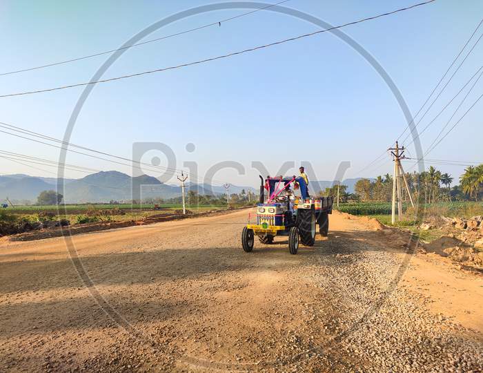 Tractor moving on a road