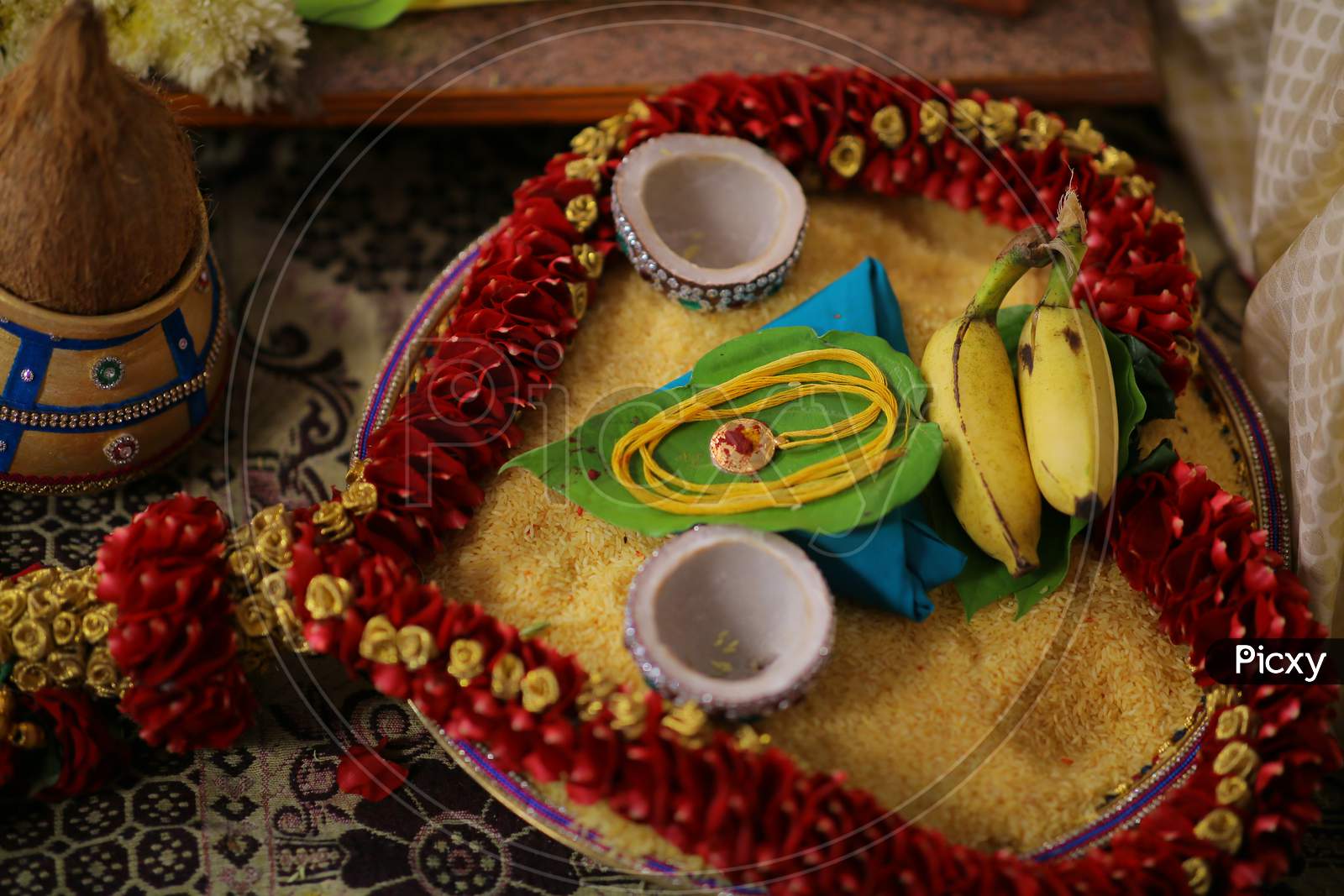 Image of Traditional Plates At an Indian Wedding Ceremony With Sweets