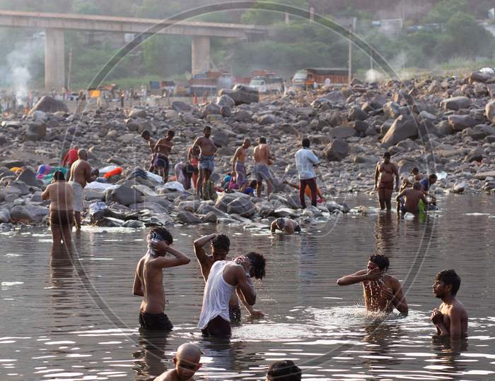 Devotees Taking Bath At Krishna River Channel In Srisailam