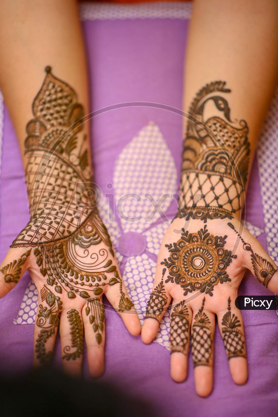 Bridal Mehndi Hands Closeup  on Her Wedding Day