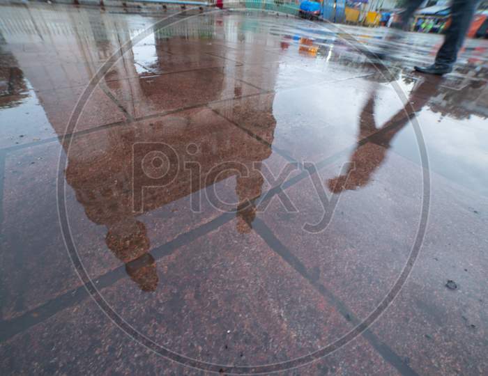 Reflection Of Charminar On Water Surface