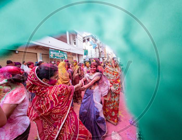 Indian Women cheering during Holi Festival