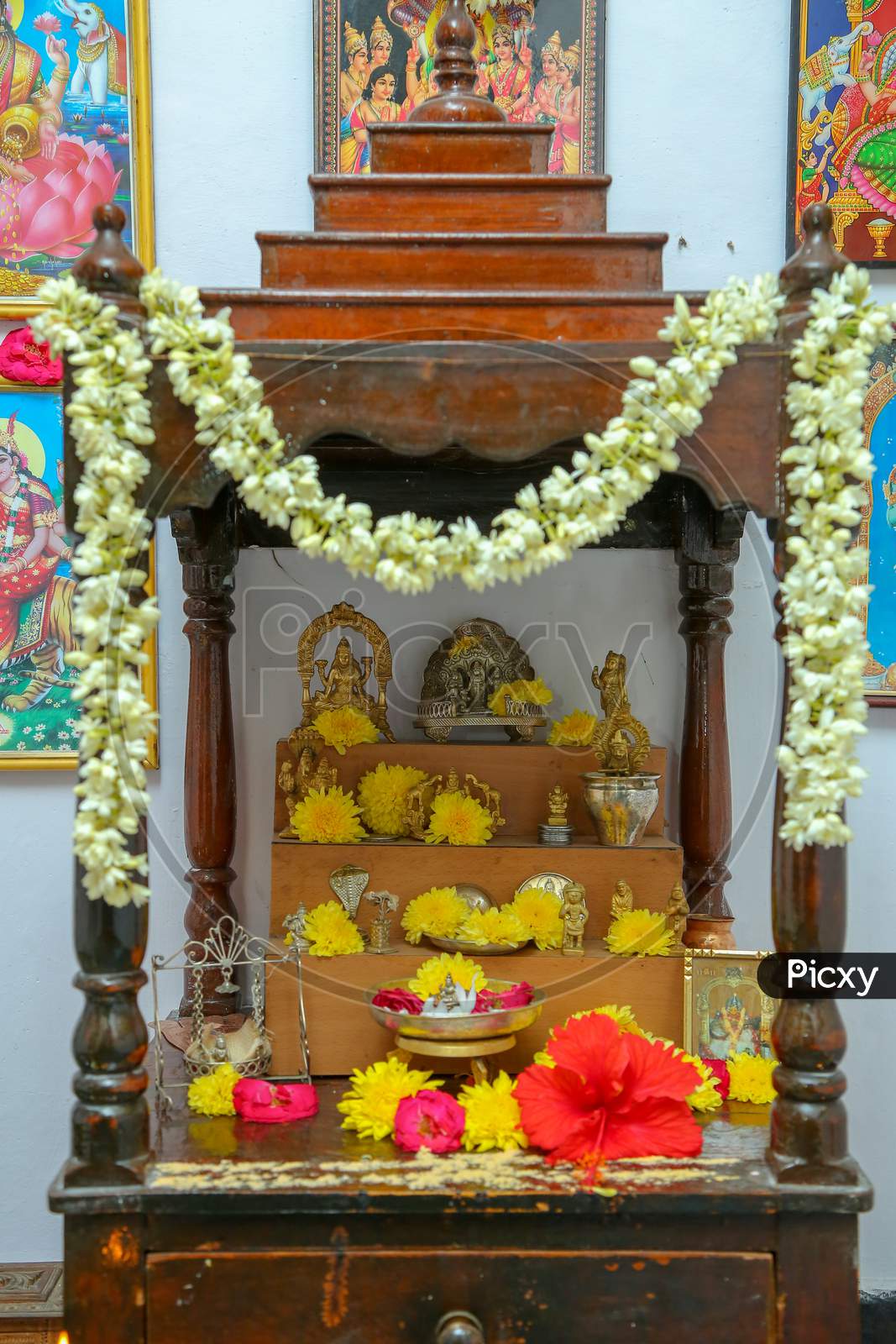 Hindu God Idols  And Photo frames  At  Pooja Rooms
