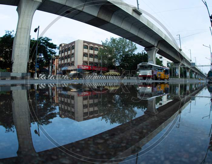 Reflection Of Metro Track And Pillars on an Water Surface