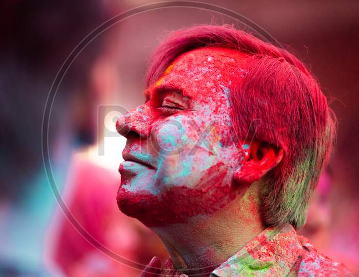 Portrait of Indian man's face during Holi