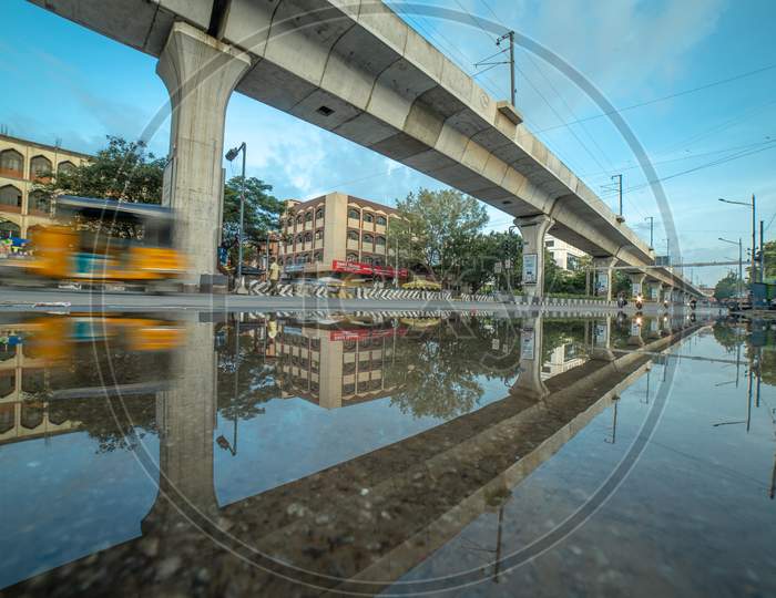Reflection of Metro Rail Bridge in the water
