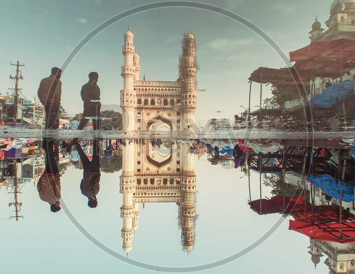Reflection of Charminar in the stagnant water