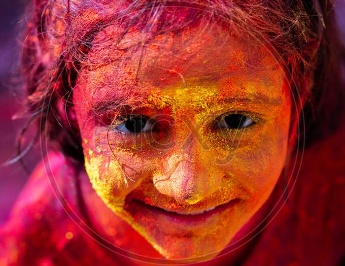 Portrait of an Indian girl's face during Holi Festival