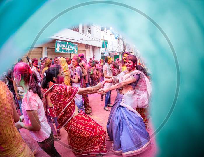 Indian girls playing during Holi Festival