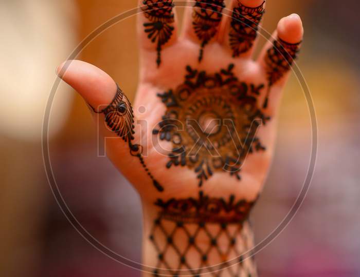 Bridal Mehndi Hands Closeup  on Her Wedding Day