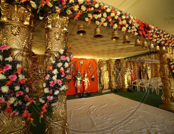 Decorated Stages With Fresh Blooming Flowers At Indian Wedding Ceremony