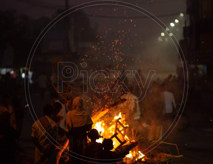 Indian People celebrating Bhogi Festival