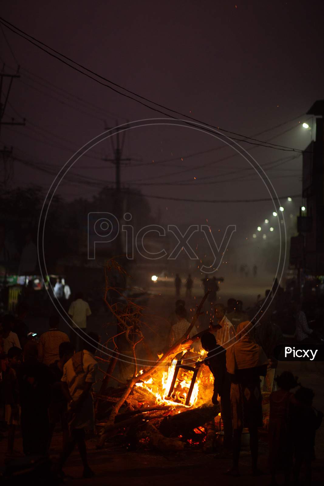 Bonfire lit for the Bhogi Festival during early morning