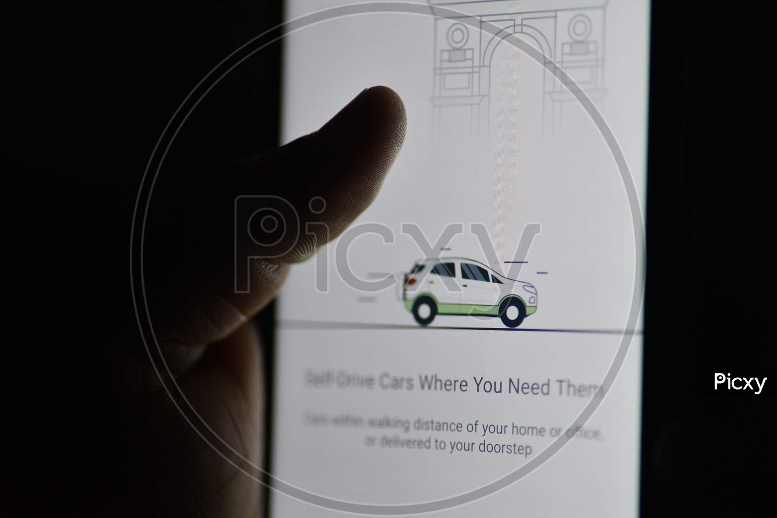 A mobile display showing Cars24 app screen