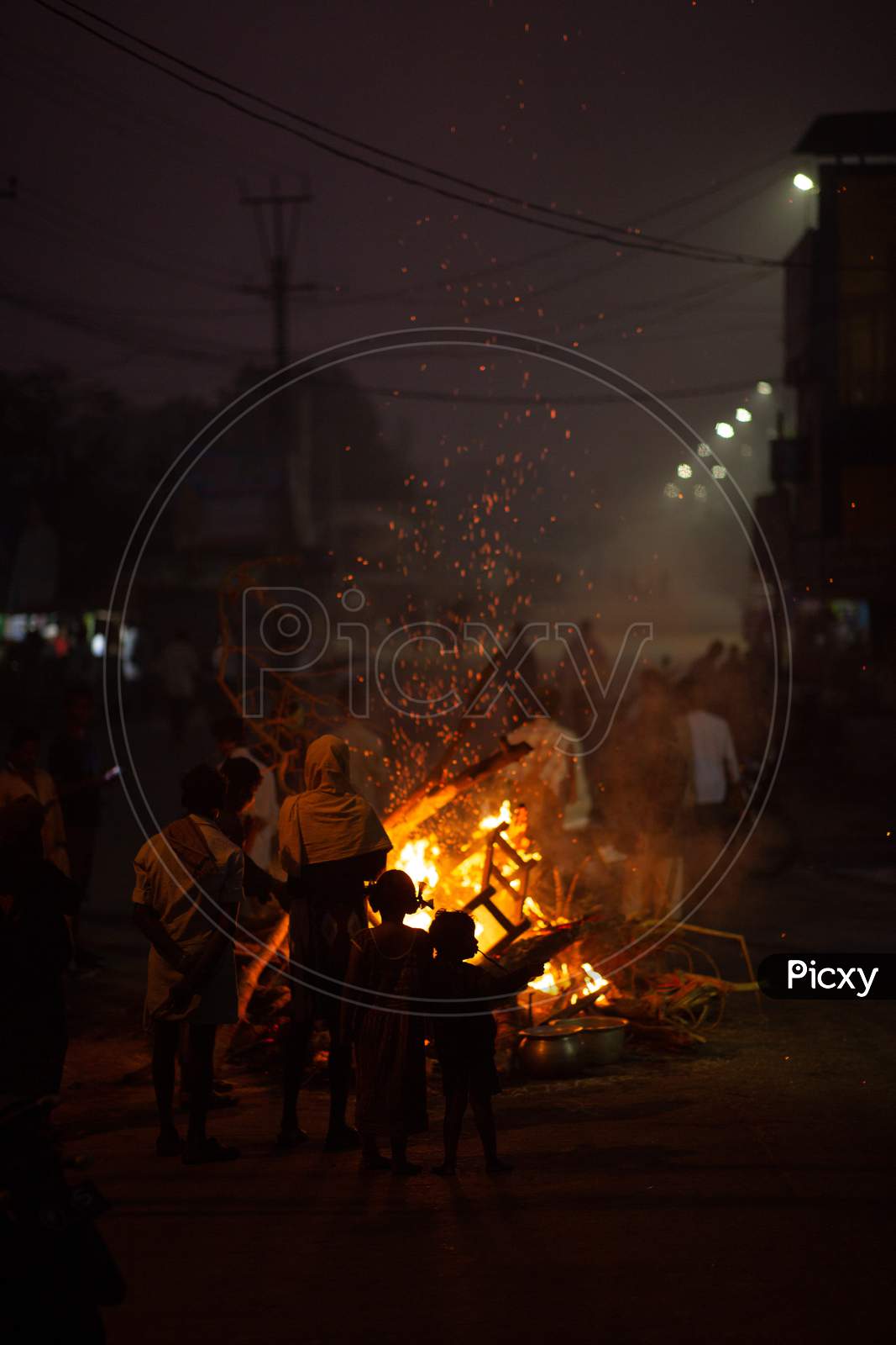 Indian People celebrating Bhogi Festival