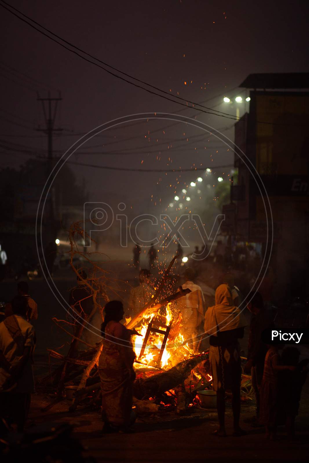 People during Bhogi bonfire