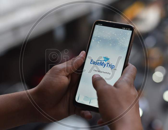 Indian Man registering on EaseMyTrip.Com mobile app