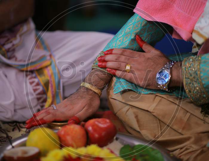 Indian bride groom during puja