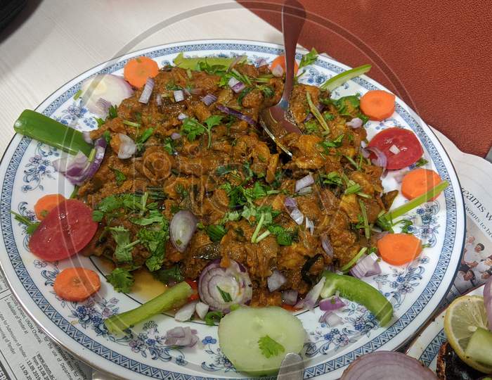 Indian Chicken fry garnishes in a plate