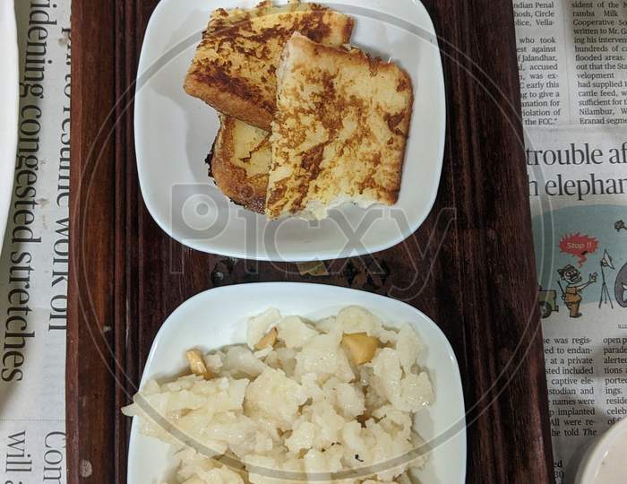 Bread Toast with crushed banana in the plate