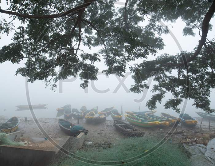 Fishing Boats At The Bank Of A Fresh Water Lake  On an Winter Morning  At Palakollu