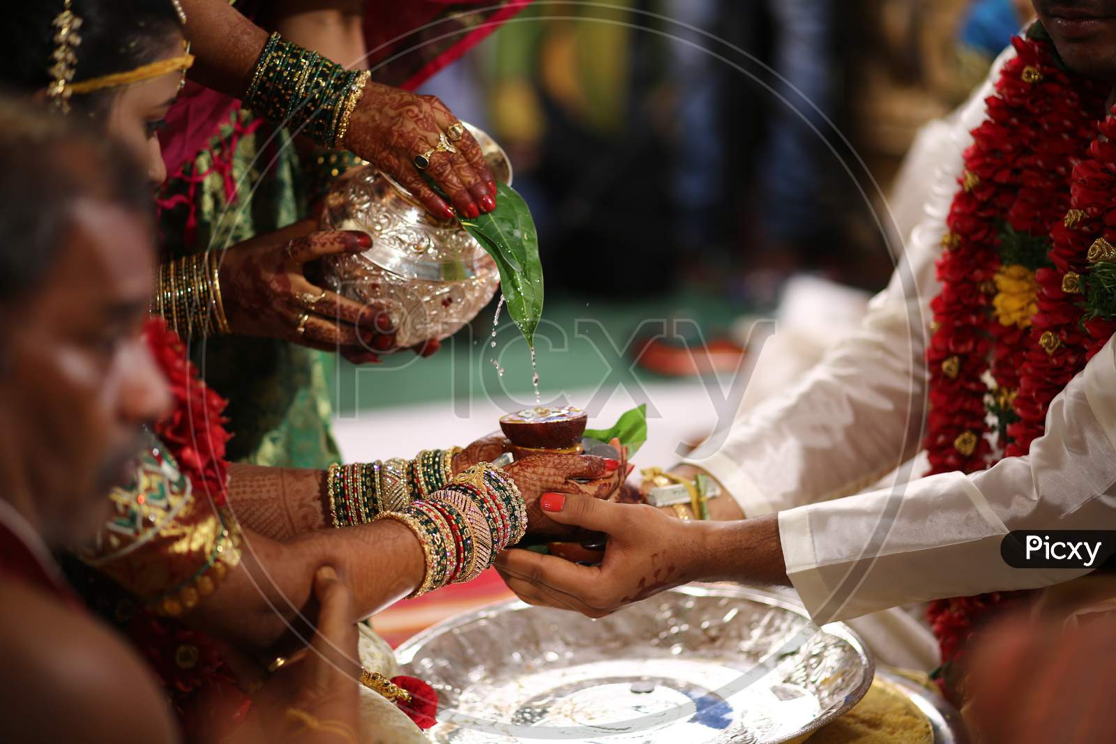 Indian Bride and Groom during wedding puja