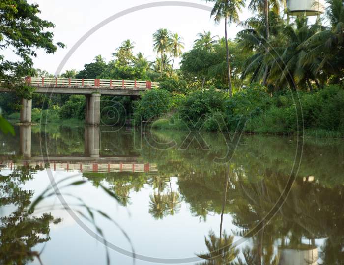 A Bridge Over a Water Channel In an Rural Village